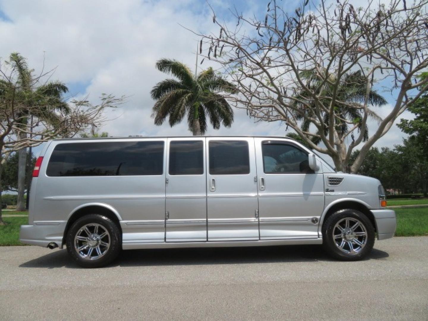 2014 Chevrolet Express (1GBWGLCG3E1) , located at 4301 Oak Circle #19, Boca Raton, FL, 33431, (954) 561-2499, 26.388861, -80.084038 - You are looking at a Rare 2014 Chevy Express 2500 Quigley 4x4 Four Wheel Drive Explorer Limited SE 9 Passenger Conversion Van with: 107K Original Miles, 6 Captain Chairs, Rear Power Folding Bench Seat Bed, Center Consoler Cooler, Front PPF (Paint Protection Film) Explorer Limited Conversion Througho - Photo#6